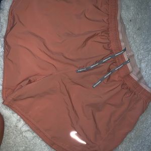 Light/rose pink running shorts Nike